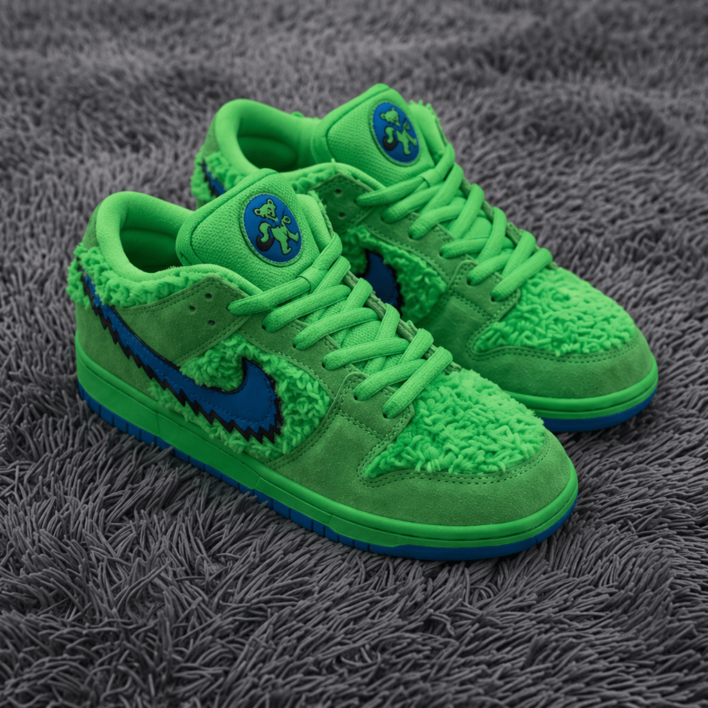 Green sneakers with blue accents on a gray textured surface