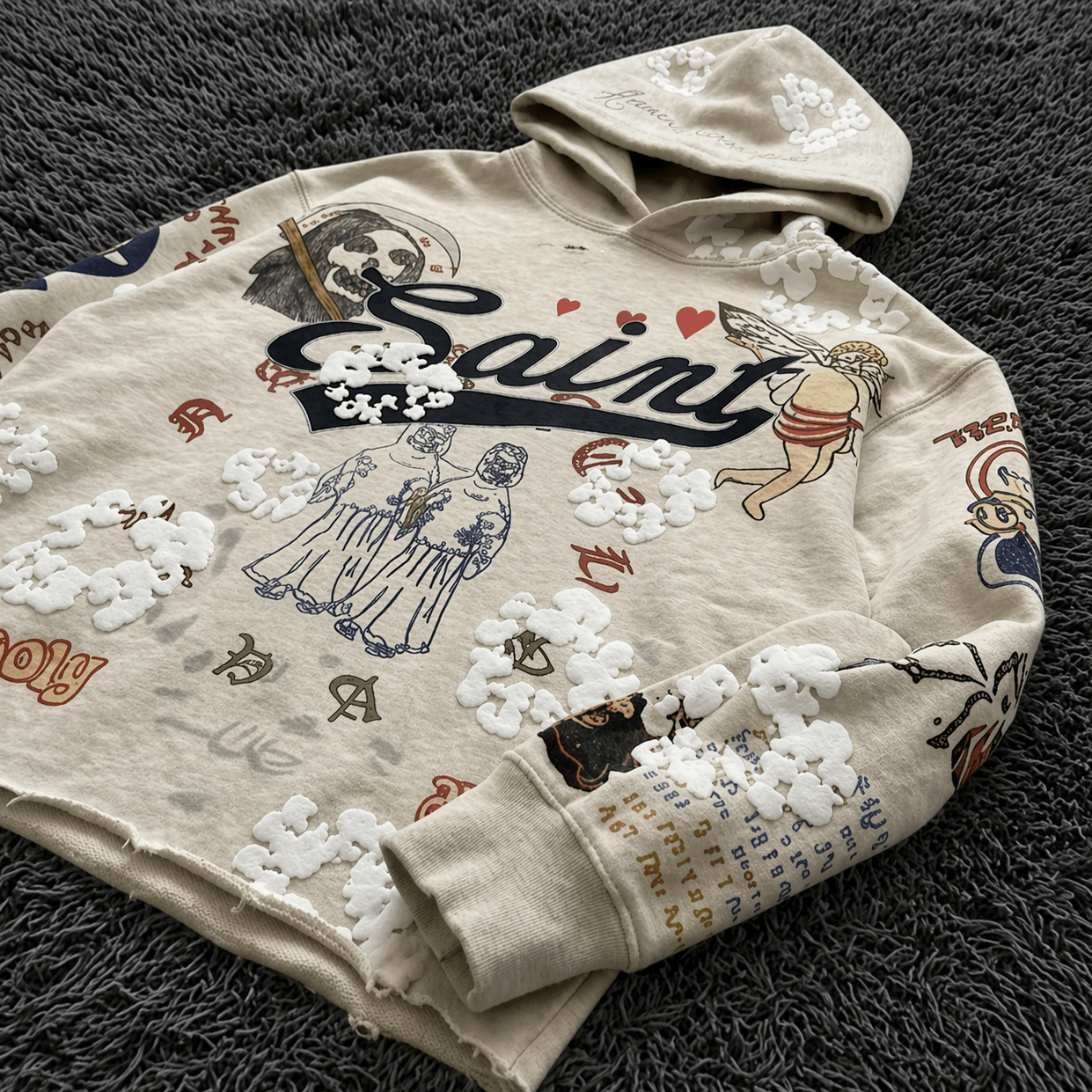 SAINT MxxxWxxx Graffiti Collage Hoodie - Distressed Saint/Reaper Graphic